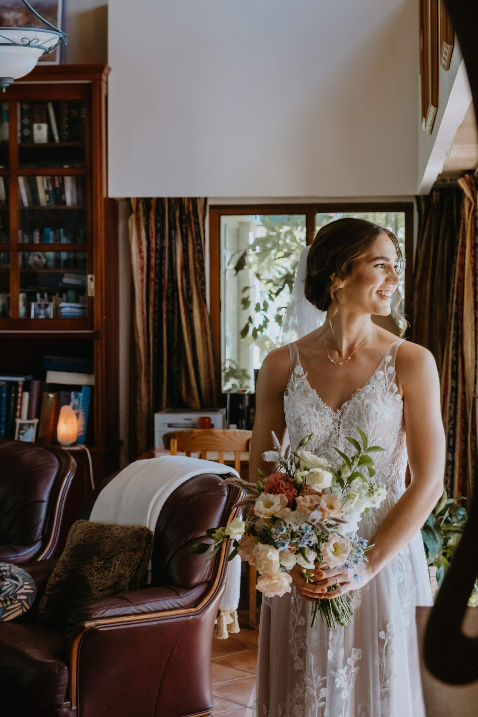Bride holding bouquet of flowers