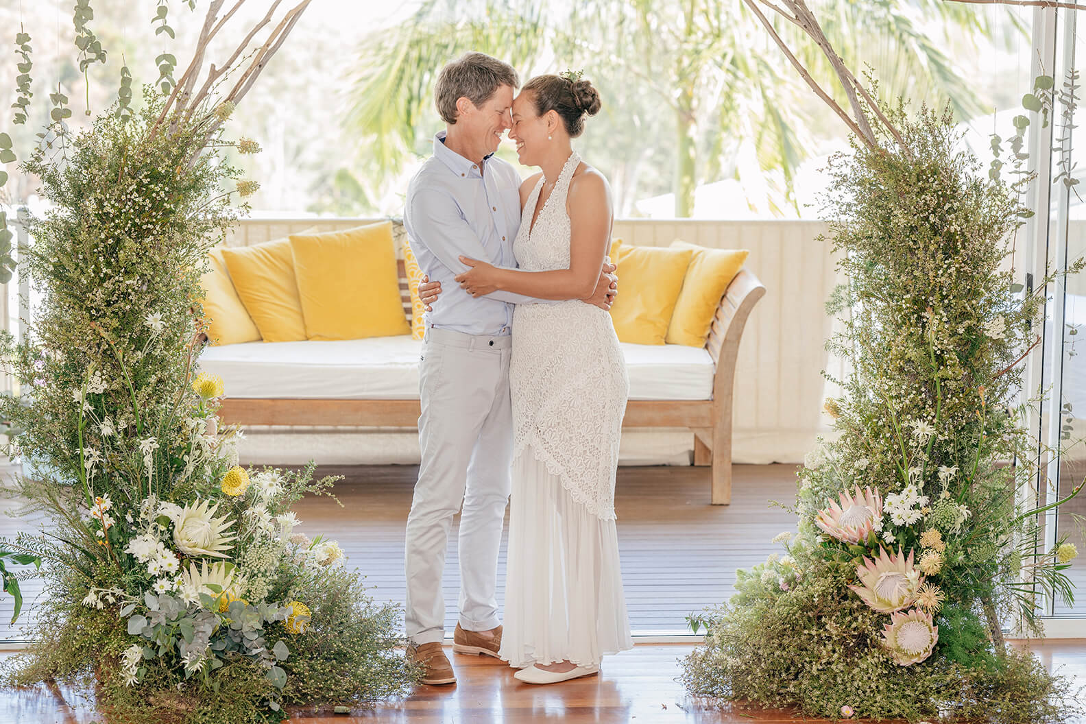Brides bouquet on a wooden barrel.